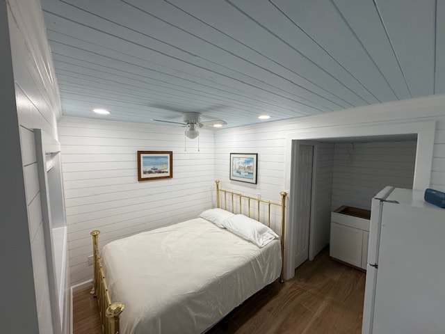 Coastal bedroom at Moxie Girl 1 Atlantic Beach NC with shiplap walls and beach decor